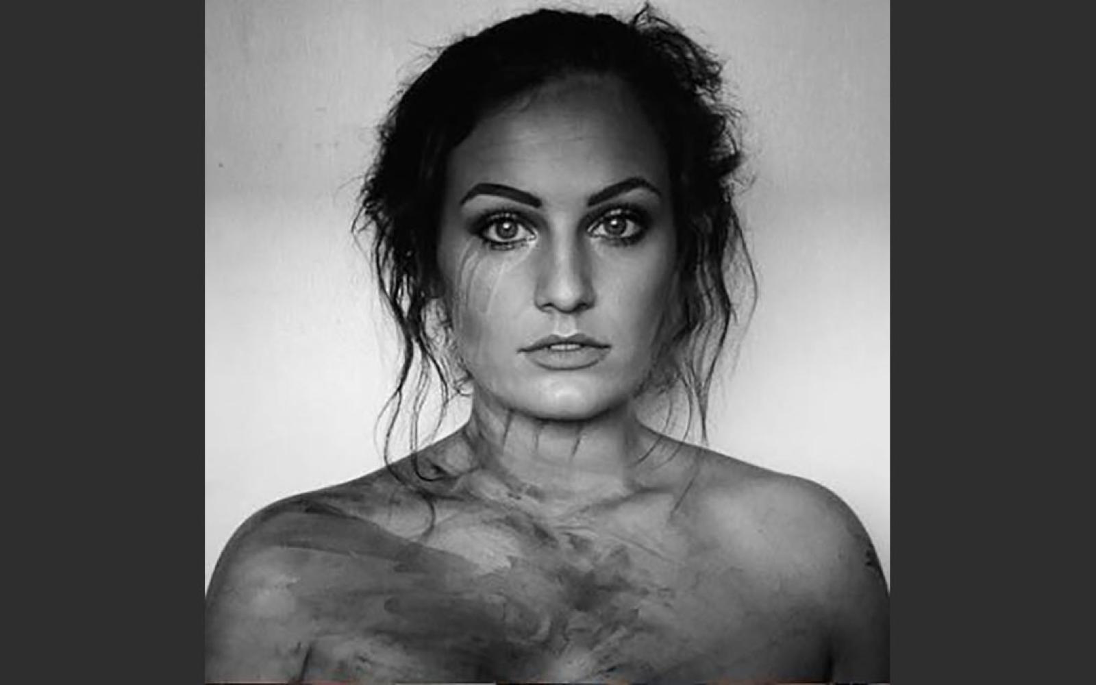 Singer/Songwriter Kat Hasty's album cover for "Drowning in Dreams" was taken with her iPhone after a day working as a face painter.