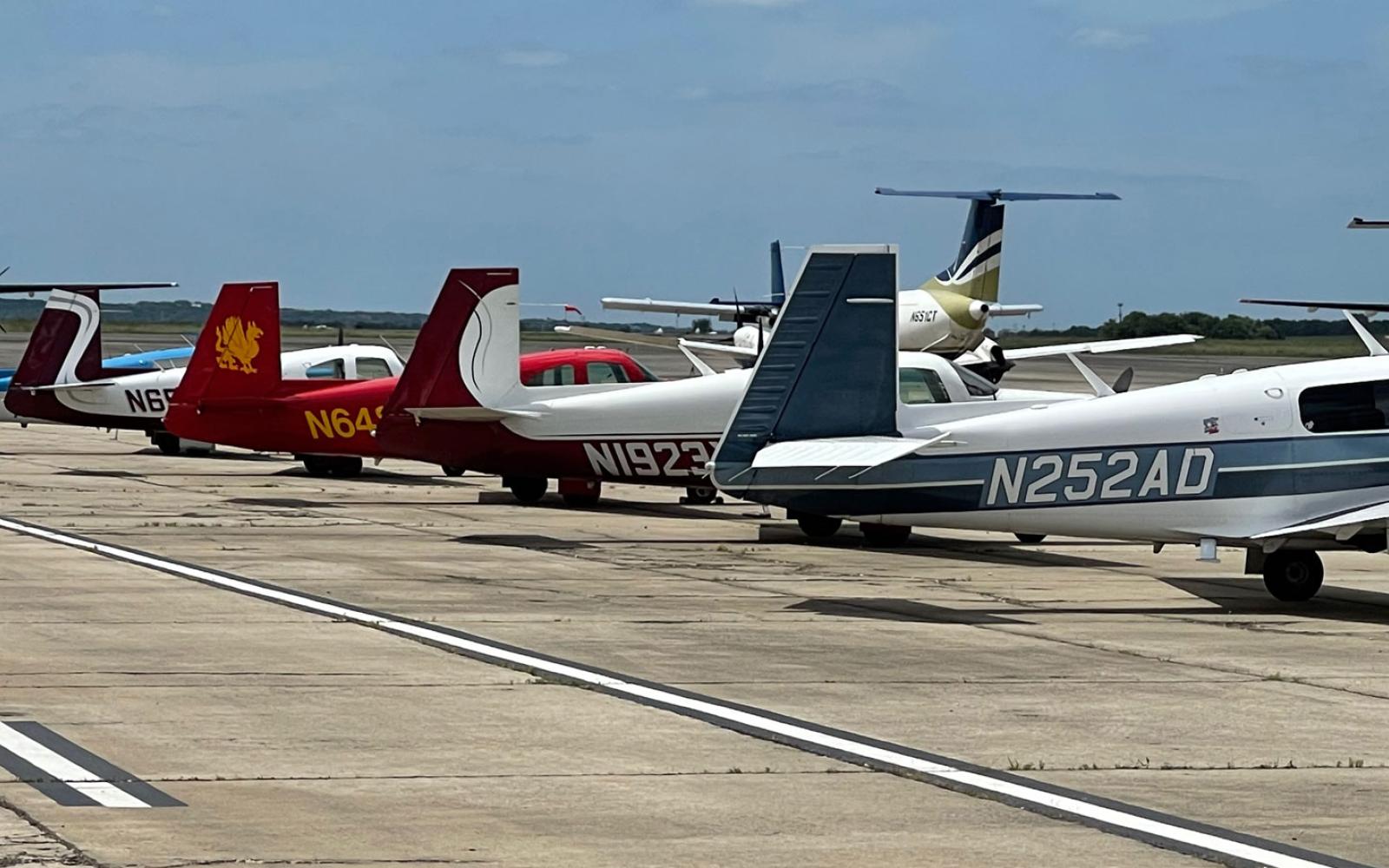 The signature tail of the Mooney M20 aircraft design shown at the Texas Wing Formation Clinic at San Marcos Regional Airport in 2021