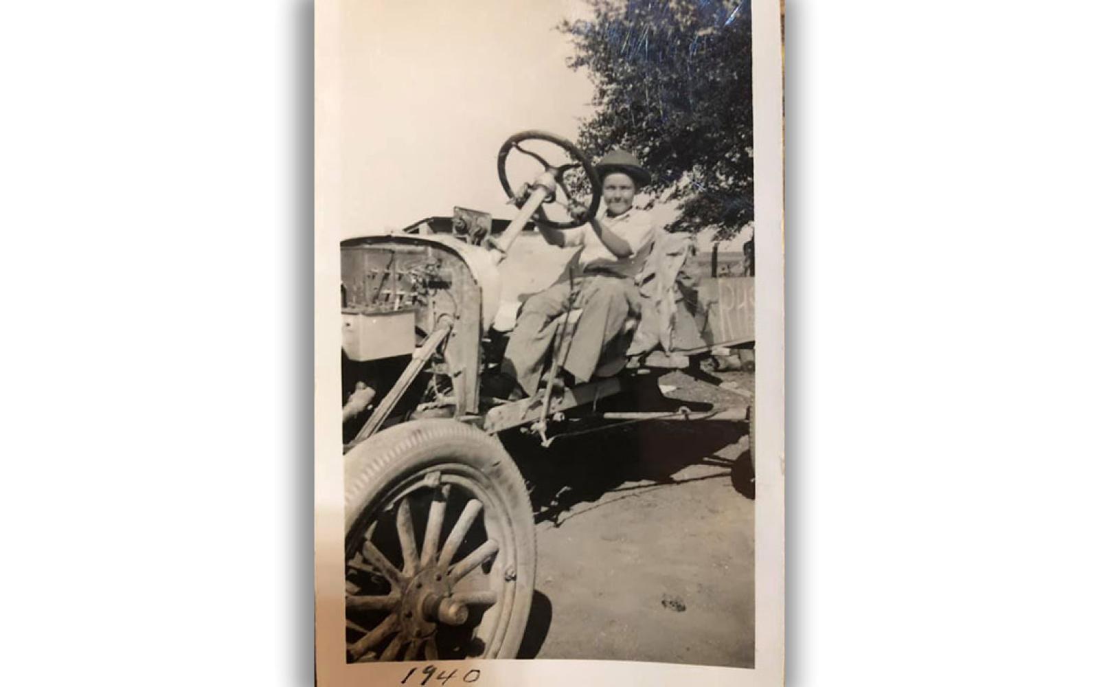Charles Engdahl in the car he built.