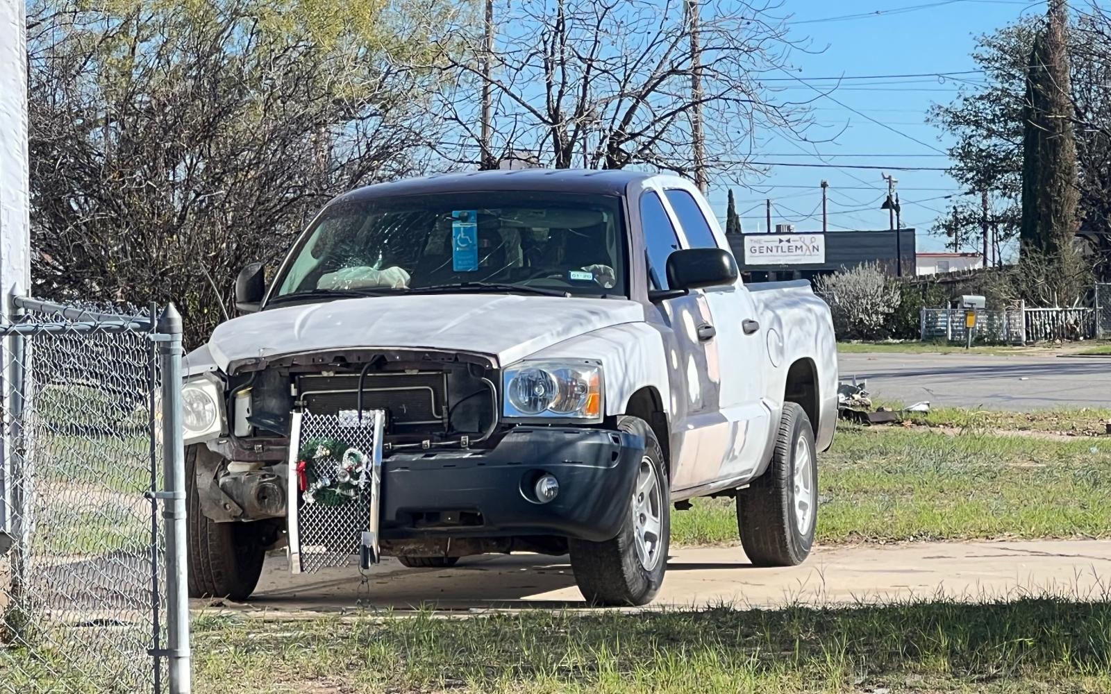 A single vehicle crash near the intersection of N. Irving St. and W. 19th St. has taken out two telephone poles on Dec. 15, 2022.