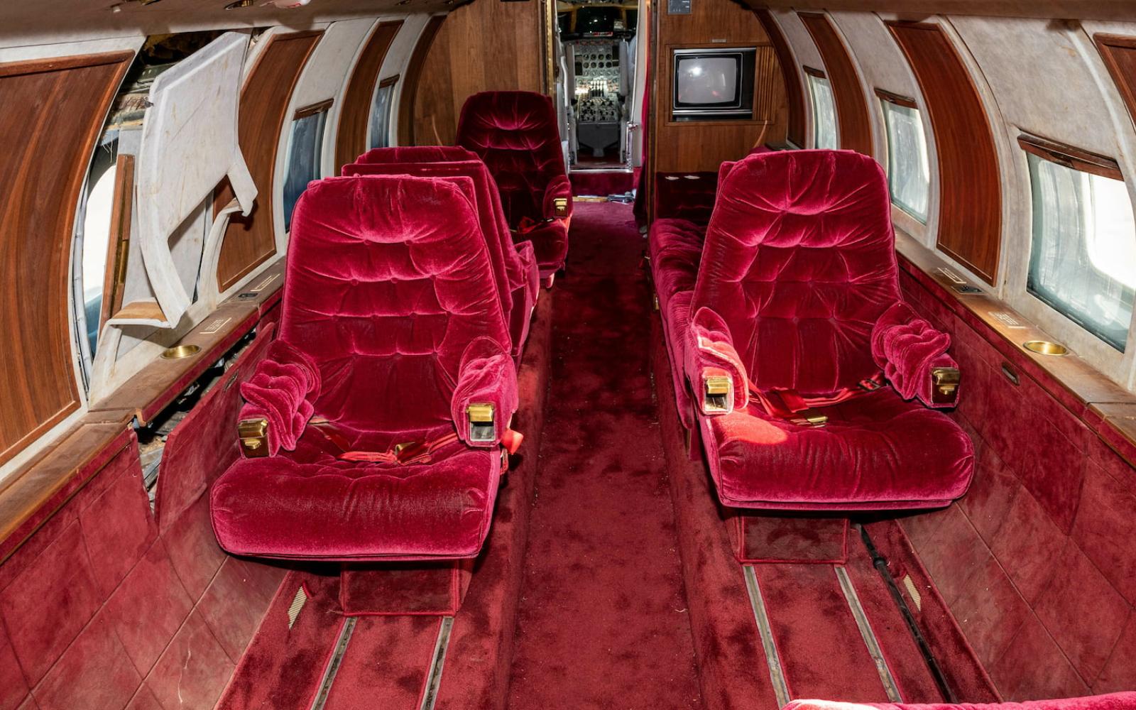 Inside the former business jet of Elvis Presley that's been parked at Roswell, NM for decades.