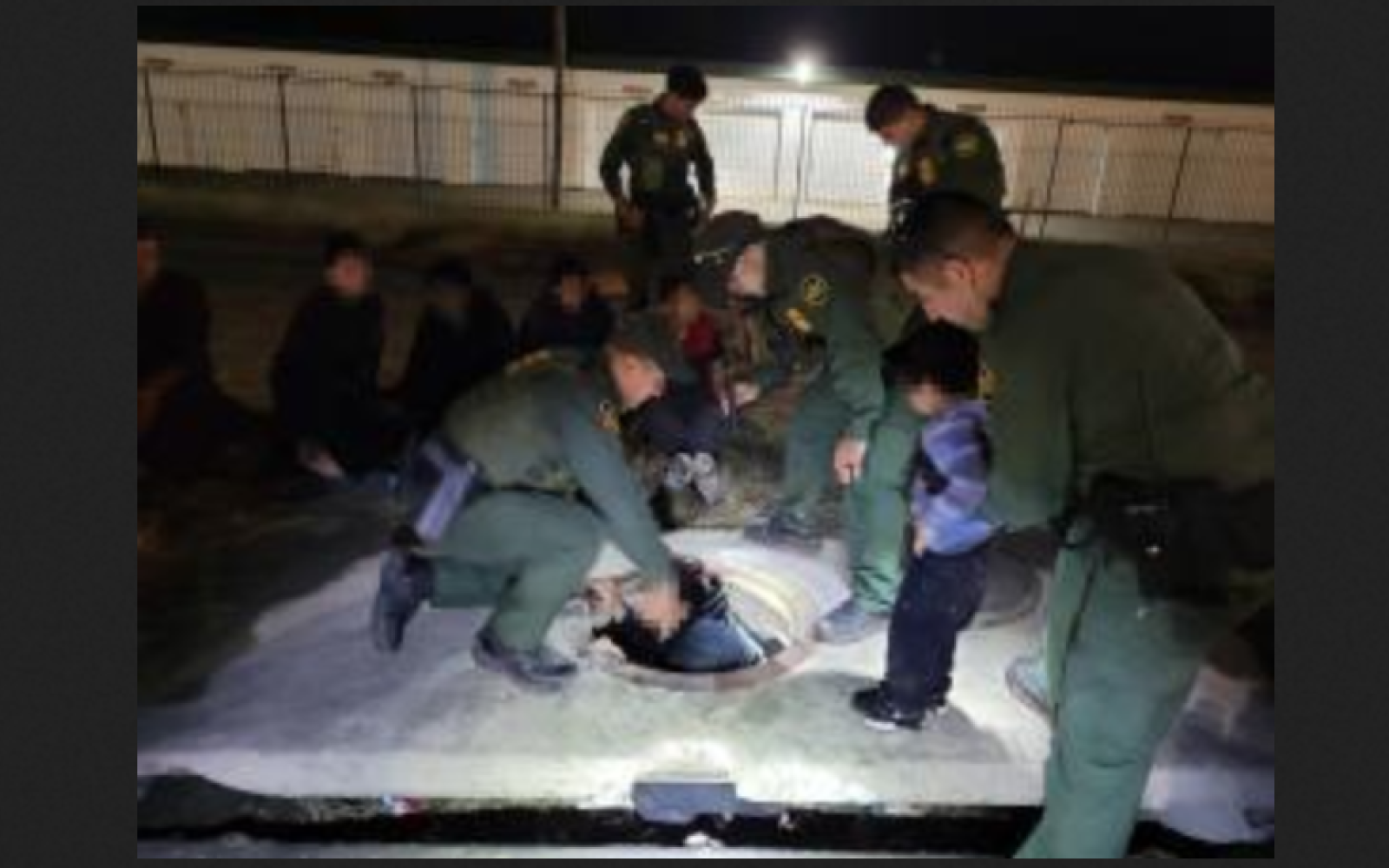 Border Agents Pull Illegals from Manhole in Laredo (Courtesy/CBP)