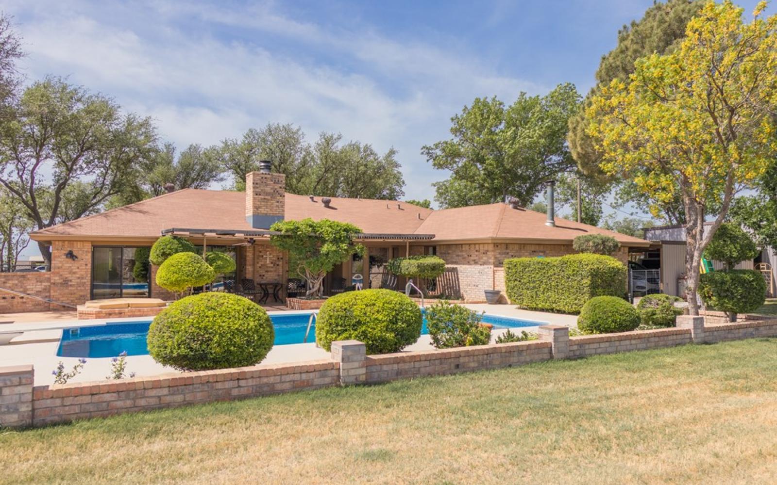 SAN ANGELO, TX — This wonderful country home provides privacy and serenity with 23.5 acres. with 2 divided pastures. Insulated workshop with 110 and 220 outlets, an additional 3-sided barn, and and covered corral with chute.