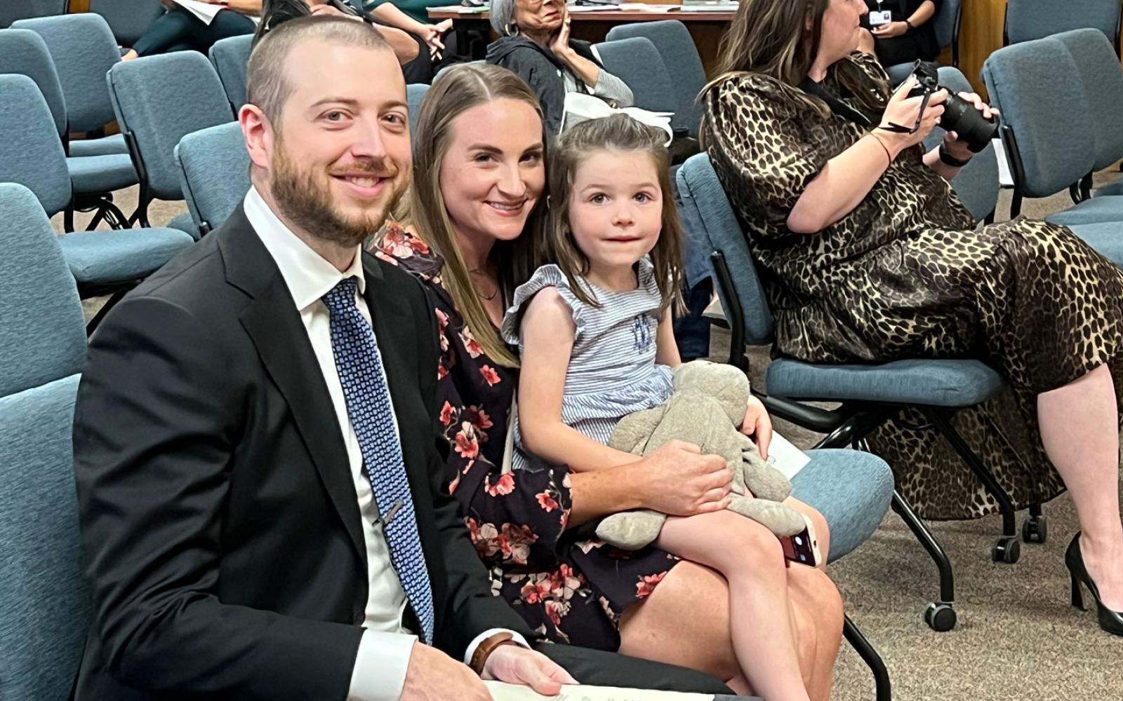 San Angelo ISD trustee Dr. Kyle Mills, DO, and his wife Kimberly and their child just prior to being sworn in on Monday, May 15, 2023.