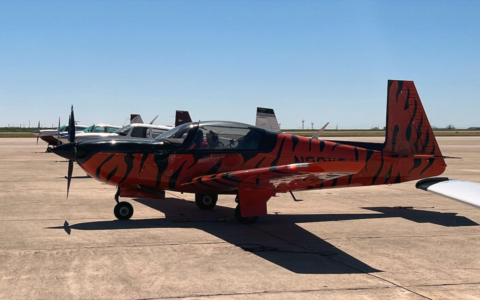 The Mooney M20T Predator looks similar to a civilian-style Mooney except for the large bubble canopy.