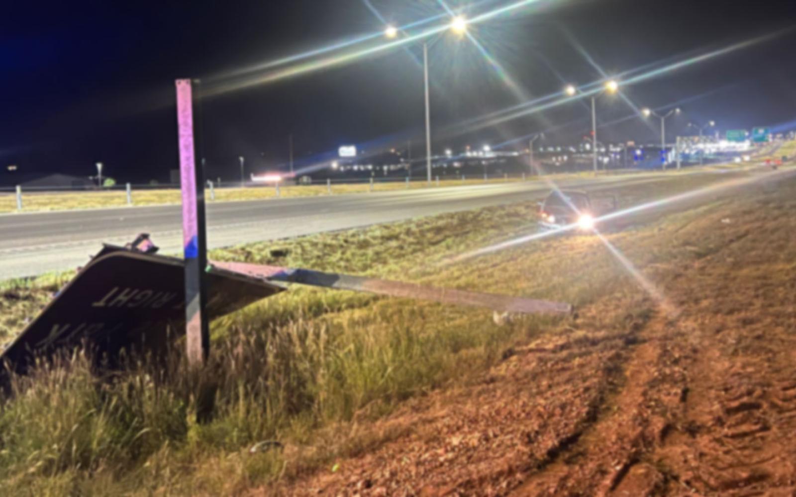 The destroyed TxDOT sign. Charges are upgraded if this damage is more than $200.