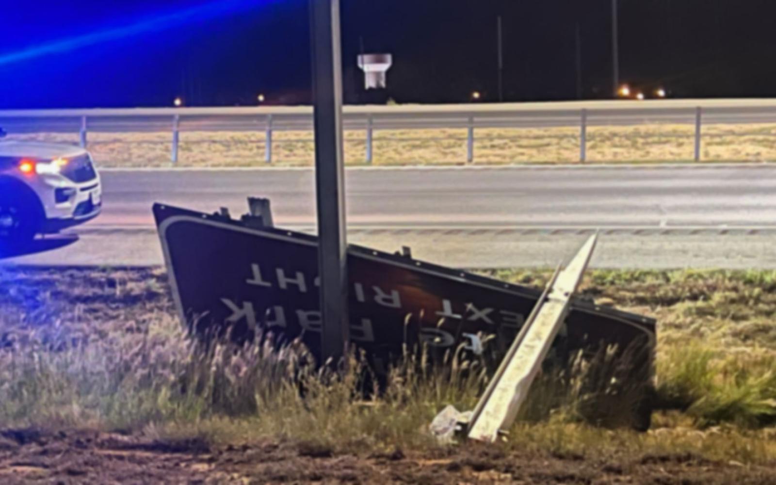The destroyed TxDOT sign. Charges are upgraded if this damage is more than $200.