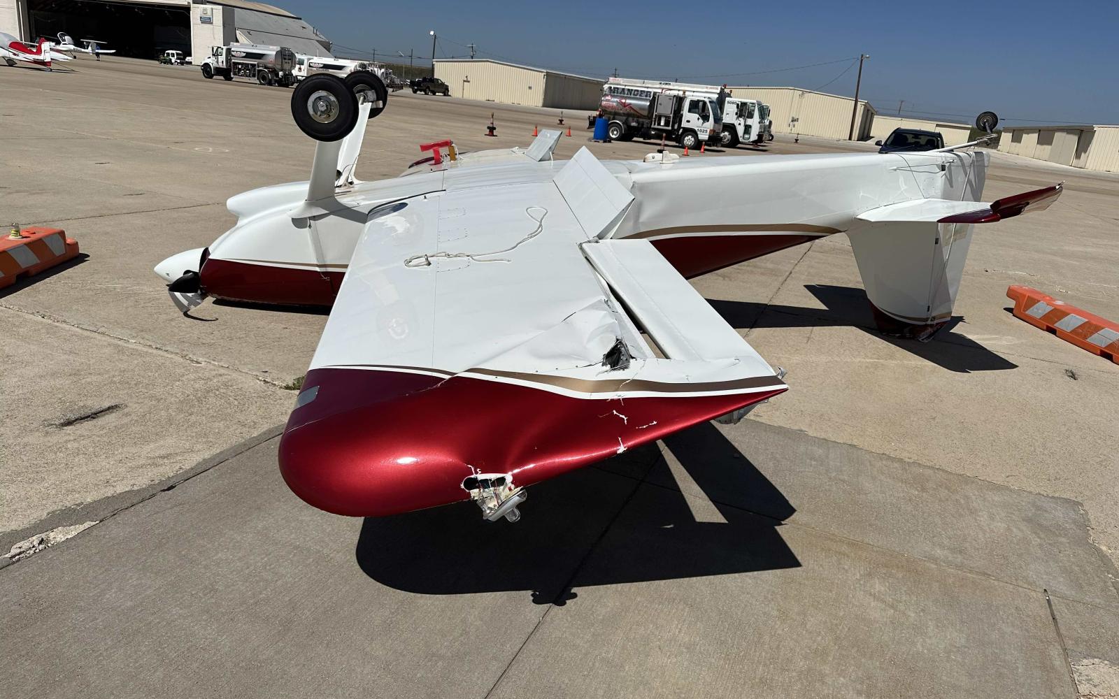 A small, general aviation plane has been resting upside down on the tarmac at San Angelo’s Mathis Field since Thursday’s thunderstorms. The plane, with its N-number registration taped over, appears to be a total loss.
