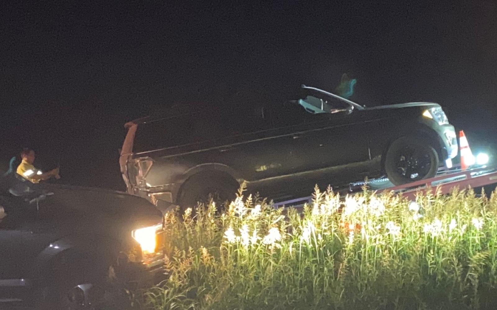 A vehicle, resembling a Chevrolet Equinox, was entirely engulfed in flames following a collision with a larger SUV on U.S. 87 S at the Hawk Ave. crossing on Oct. 1, 2023.