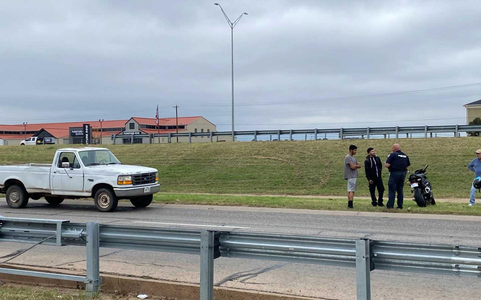 A minor accident occurred on the eastbound service road adjacent to the Houston Harte Expressway, involving a high-performance motorcycle. 