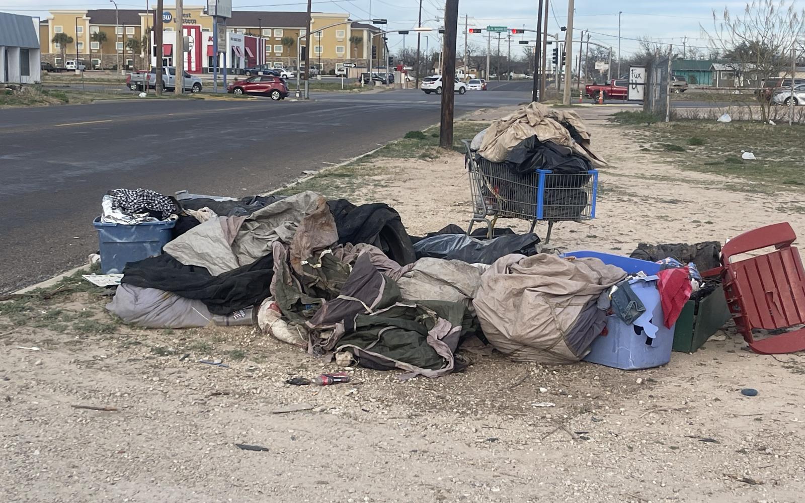 Trash Pile on 14th Street Curb in Front of Camp Entrance