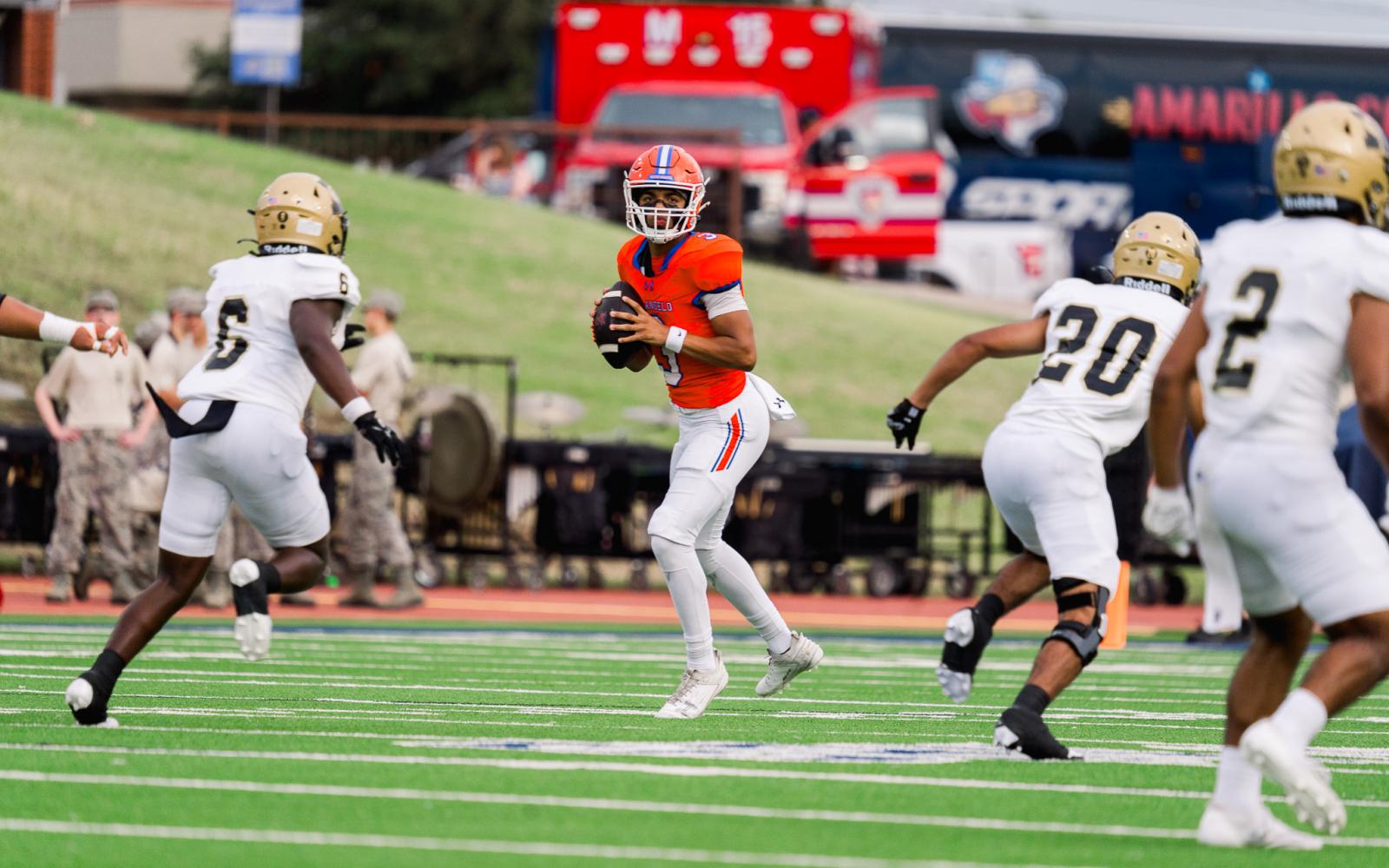 Central quarterback Christian English scans the defense against Abilene High on Friday, Aug. 30, 2024, at San Angelo Stadium.