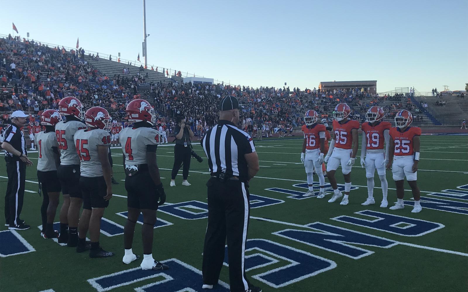 The Central Bobcats and Waco Lions meet at midfield for the coin toss before Friday's homecoming game at San Angelo Stadium on Sept. 27, 2024.