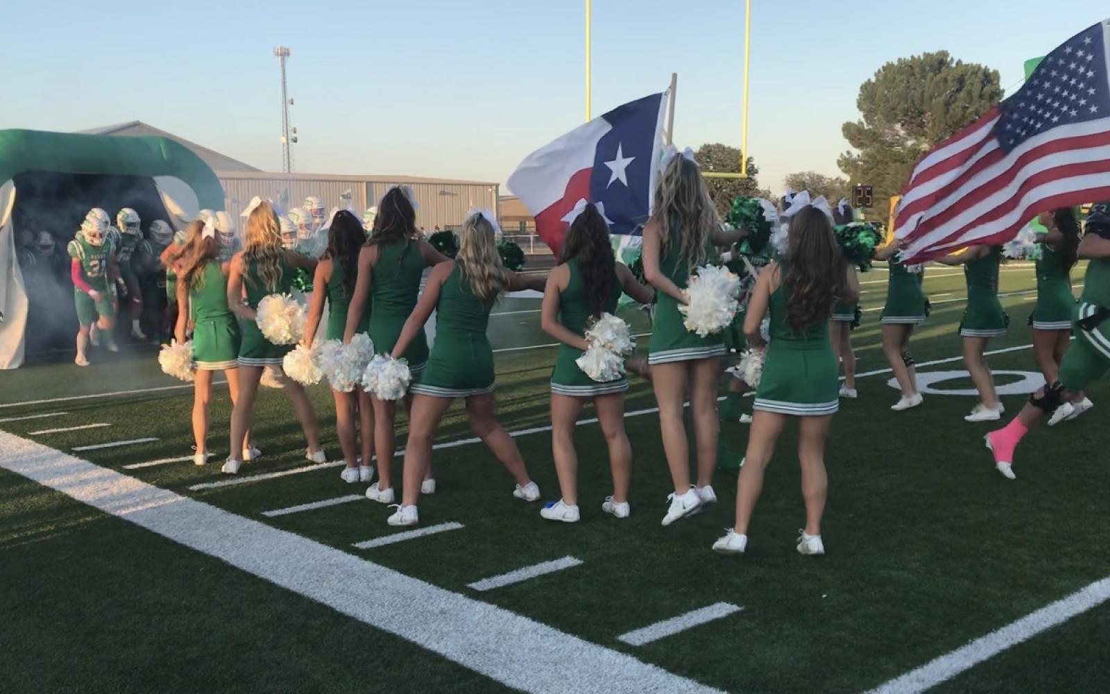 The Wall Hawks football team runs through the tunnel before its game against Idalou on Friday, Oct. 4, 2024.