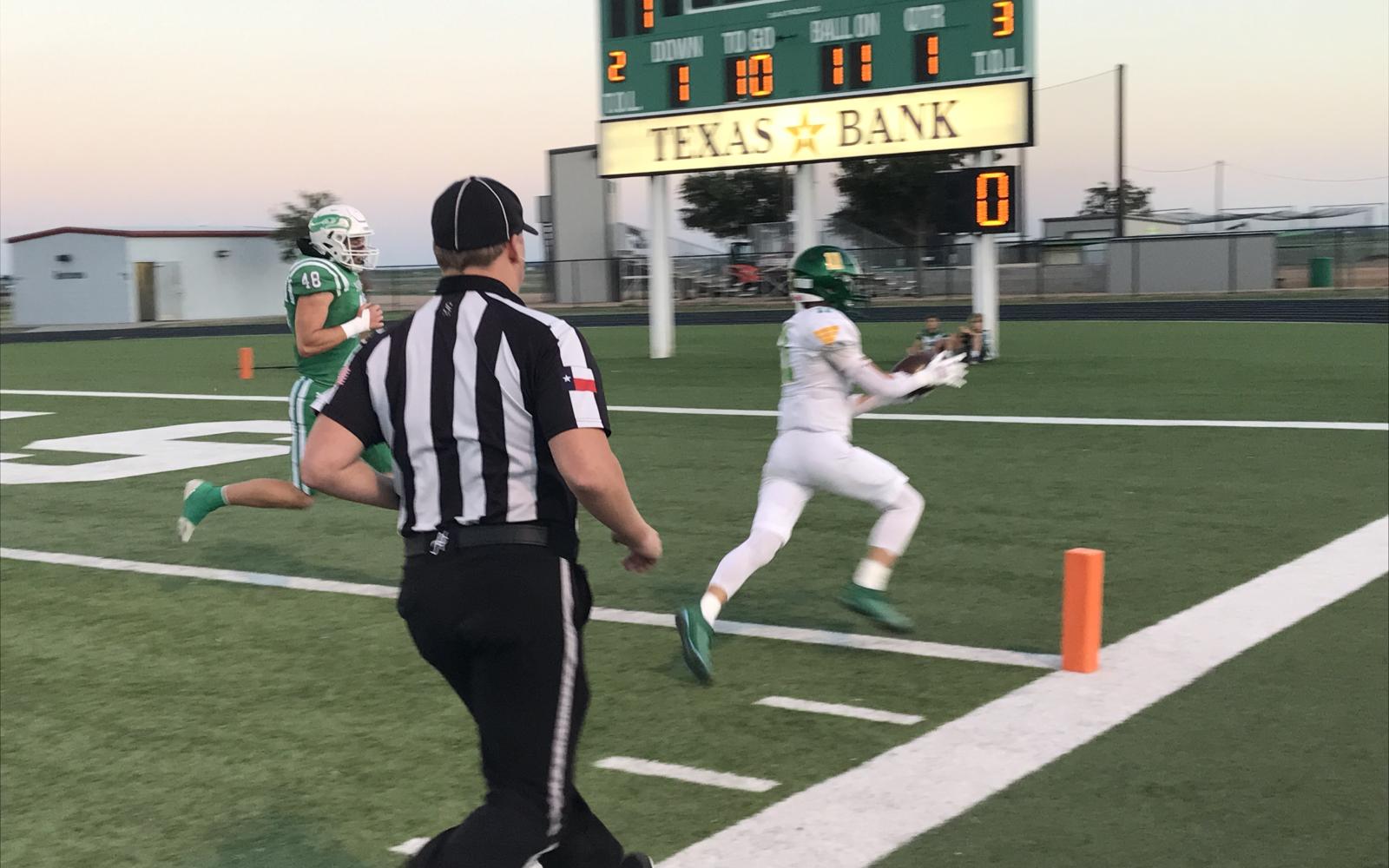 Idalou's Jenson Davis runs into the end zone for an 11-yard touchdown catch on a pass from Kutter Houchin against Wall on Friday, Oct. 4, 2024.
