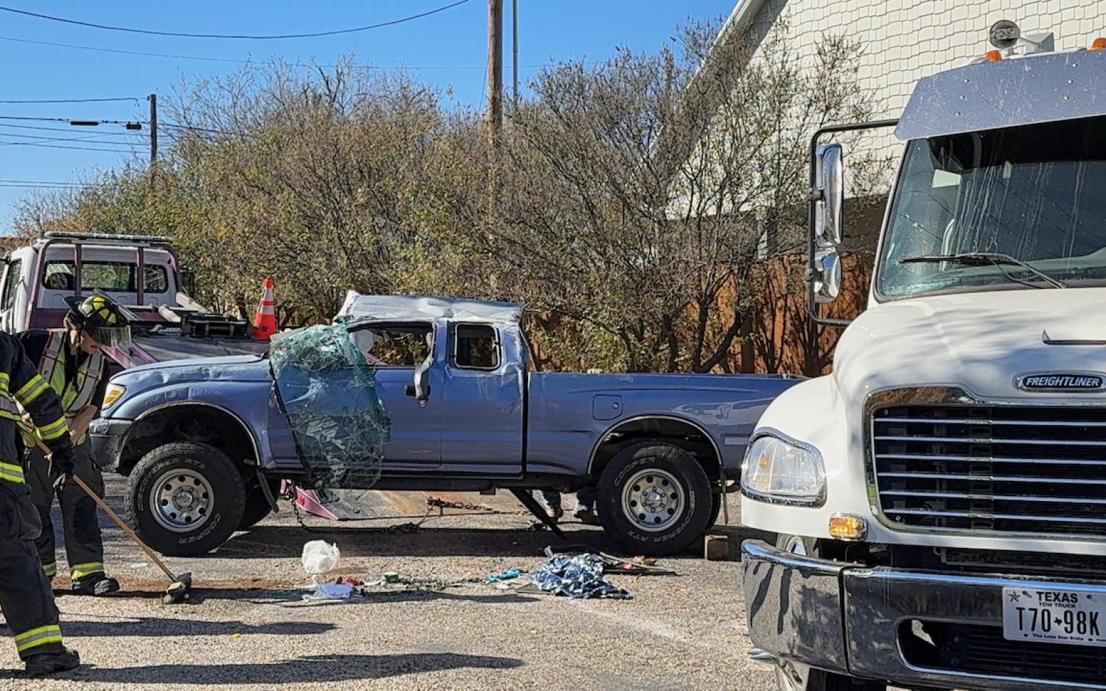 The pickup that rolled over during a crash with a red sedan on Dec 19, 2024.