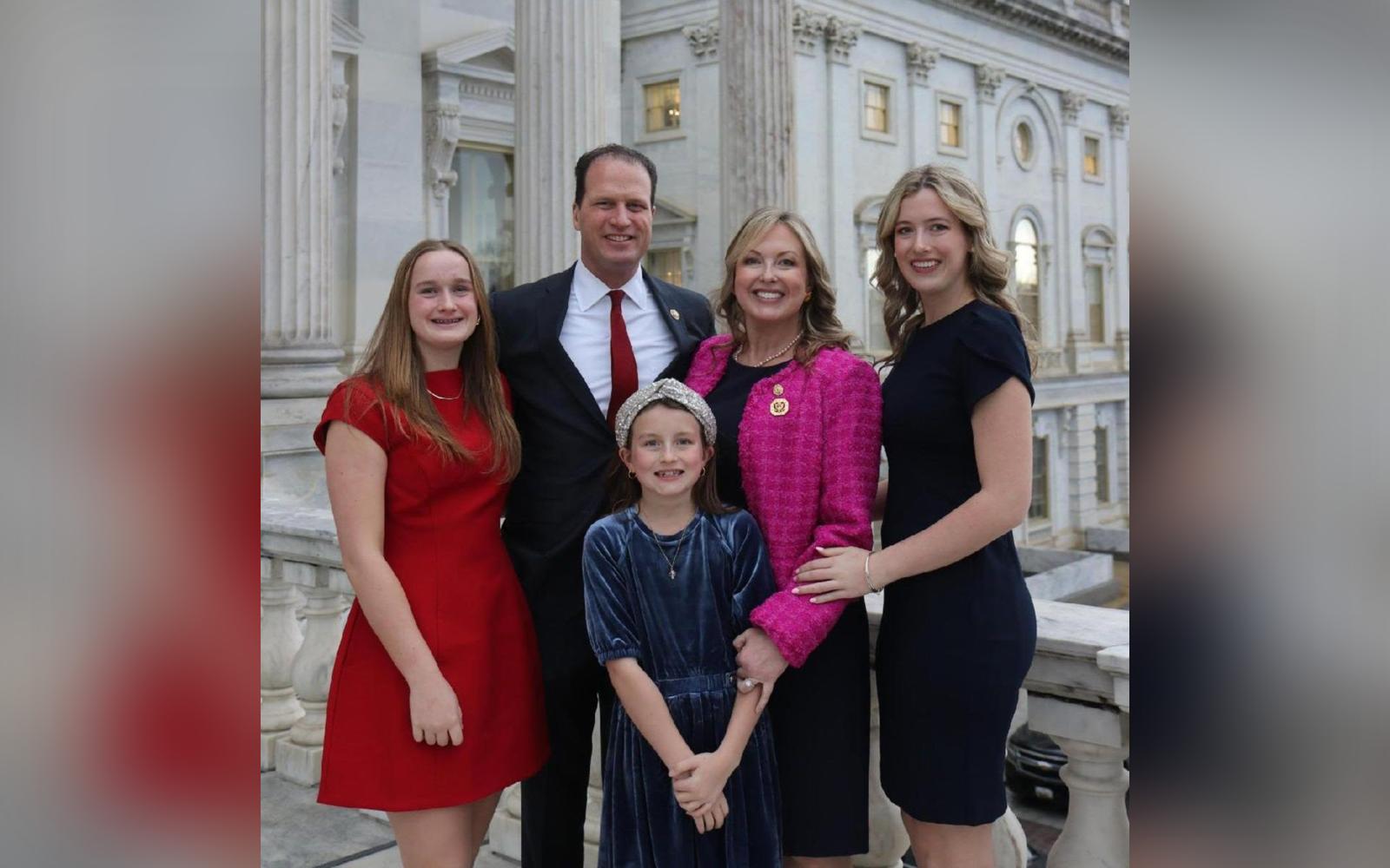 Rep. Pfluger pictured in Washington today with his wife, Camille, and their three daughters.