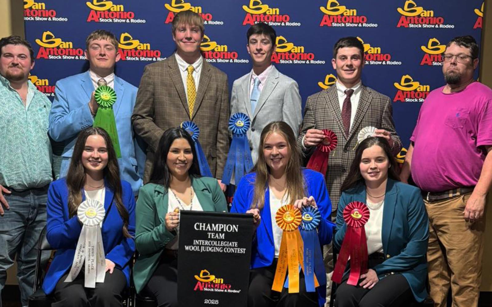 The Angelo State University Wool Judging Team celebrates its first-place finish at the 2025 San Antonio Stock Show and Rodeo Collegiate Wool Judging Contest. ASU’s Blue Team secured the championship title, defeating teams from Texas A&M and West Texas A&M. Team members are pictured with their awards and coaches following the competition.