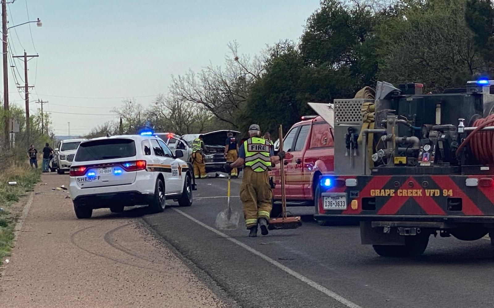 Sheriff Escorts Ambulance from Scene of Rollover Crash