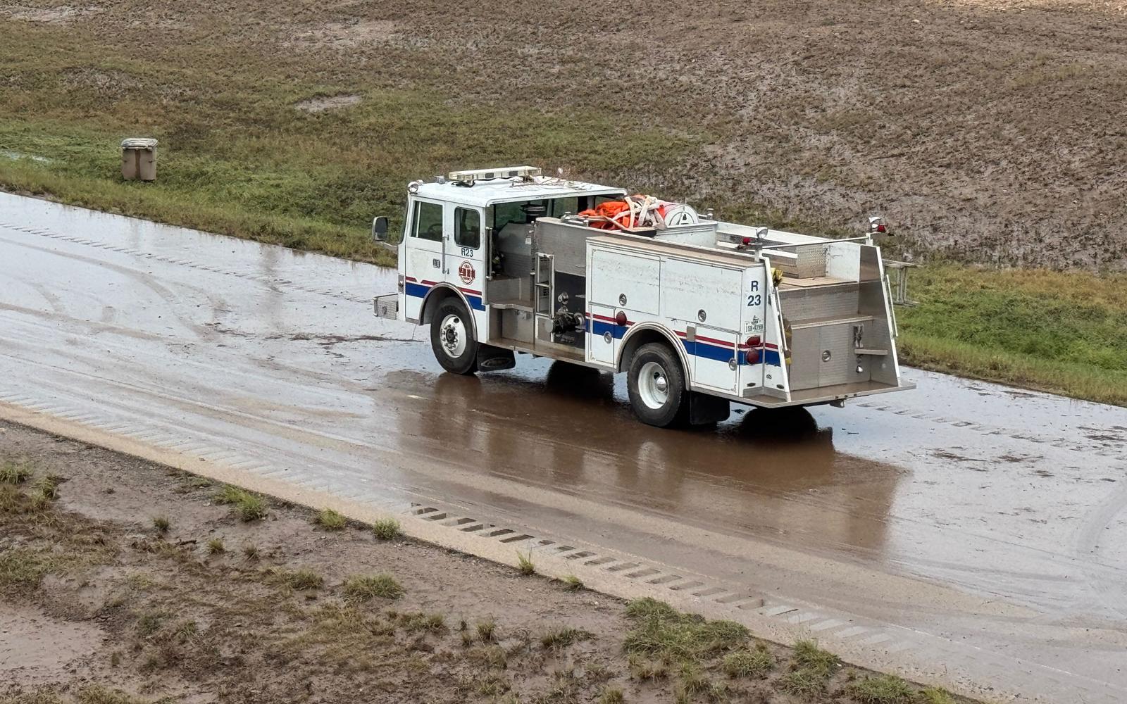 The firetruck after the water drained. It was a former SAFD fire truck sold to a volunteer fire department, Police Chief Travis Griffith guessed. It was not a SAFD truck and you can note that SAFD markings have been removed.
