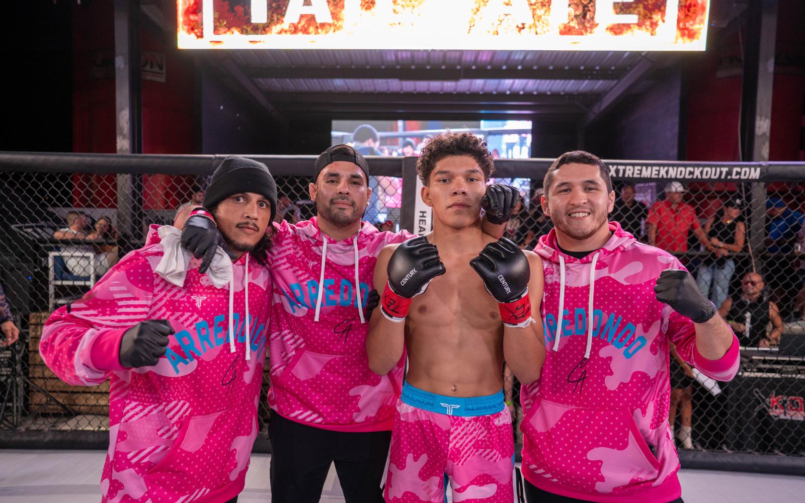 Caleb Arredondo (second from right) stands with his coaches after his MMA debut win in Midland on Sept. 20, 2025. From left: Angel Delgado, Conrad Duran, and Michael Cuellar. (Cory Hamilton Photography)
