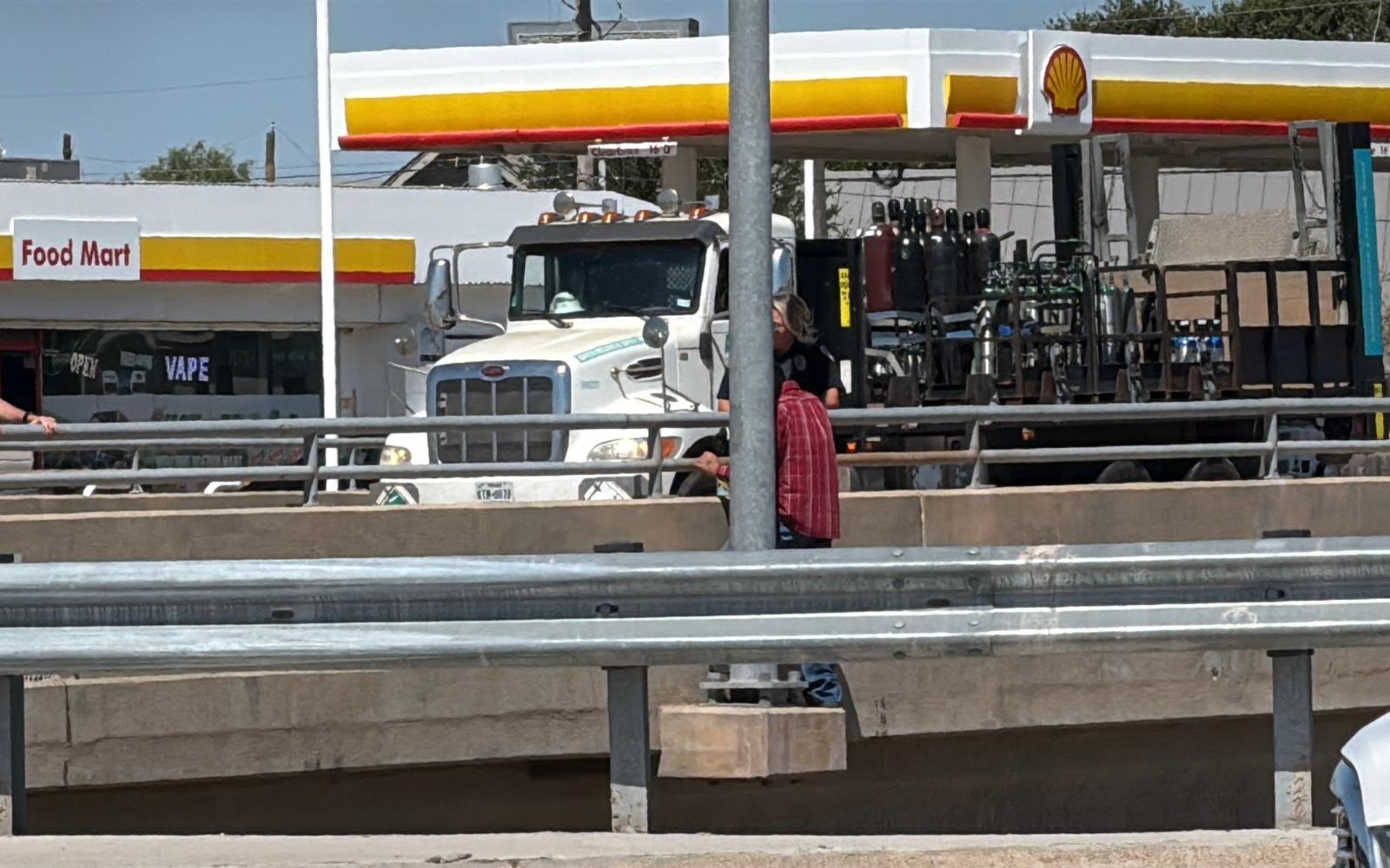 A section of the Houston Harte Expressway has been shut due to a man threatening to jump from the Main Street overpass.