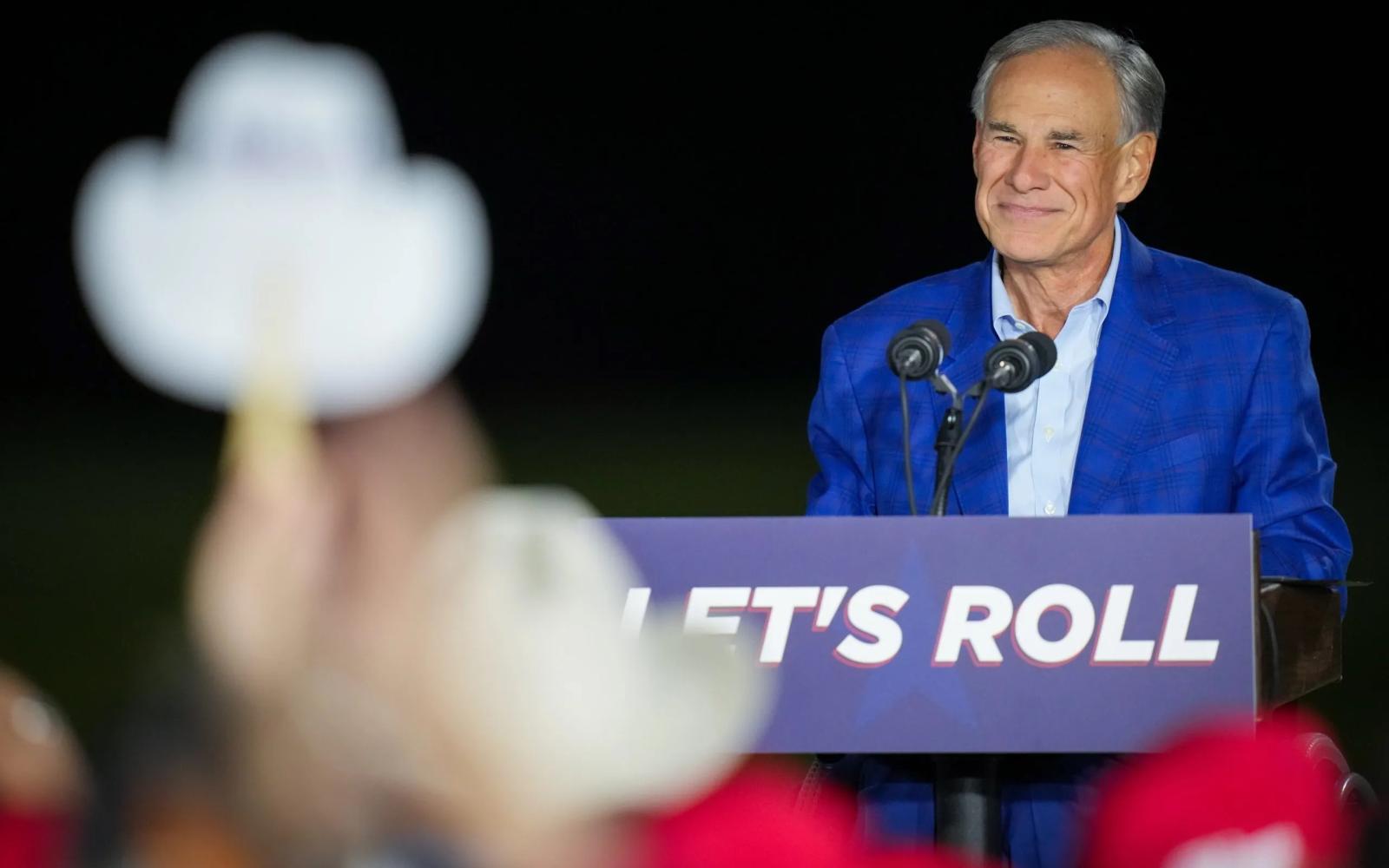 Gov. Greg Abbott smiles as people cheered after he announced his intention to run for another term as governor during an event on Sunday, Nov. 9, 2025, at East River 9 in Houston. Jon Shapley for The Texas Tribune