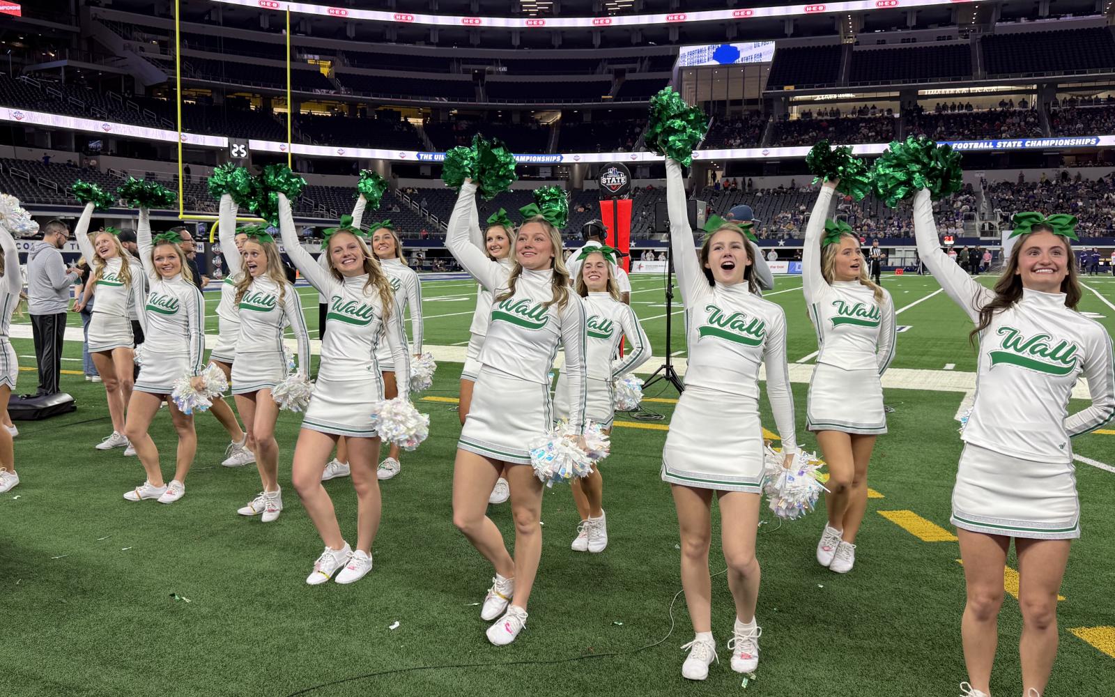 The Wall cheerleaders pump up the crowd during the Class 3A Division II state final Thursday, Dec. 18, 2025.