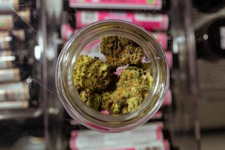 Happy Clouds smoke shop on Guadalupe Street in Austin displays hemp flower bud on March 30, 2026, the day before the state banned its sale.